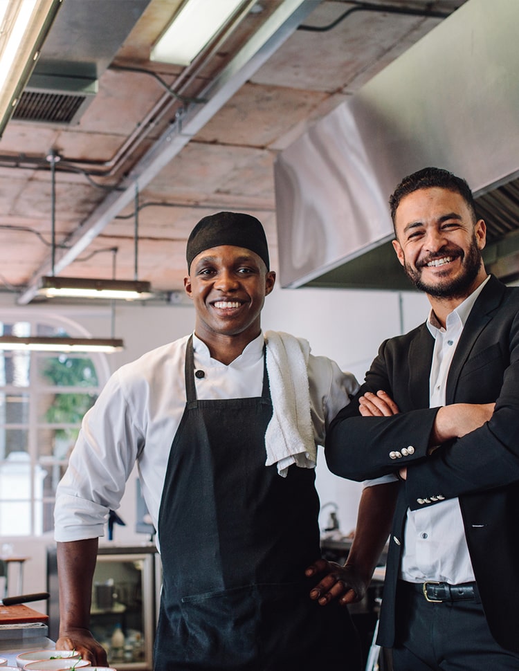 restaurant owner with chef-min restaurant owner with chef